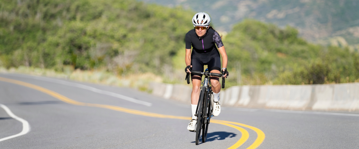Cyclist cycling up the Coll de Soller climb
